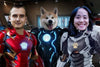 Custom superhero pet portrait with two people and a dog.